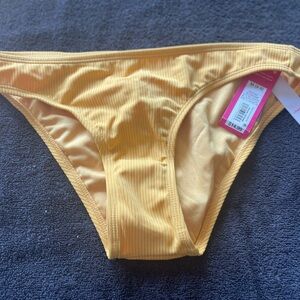 NWT golden yellow ribbed size medium bikini bottom from Xhilaration